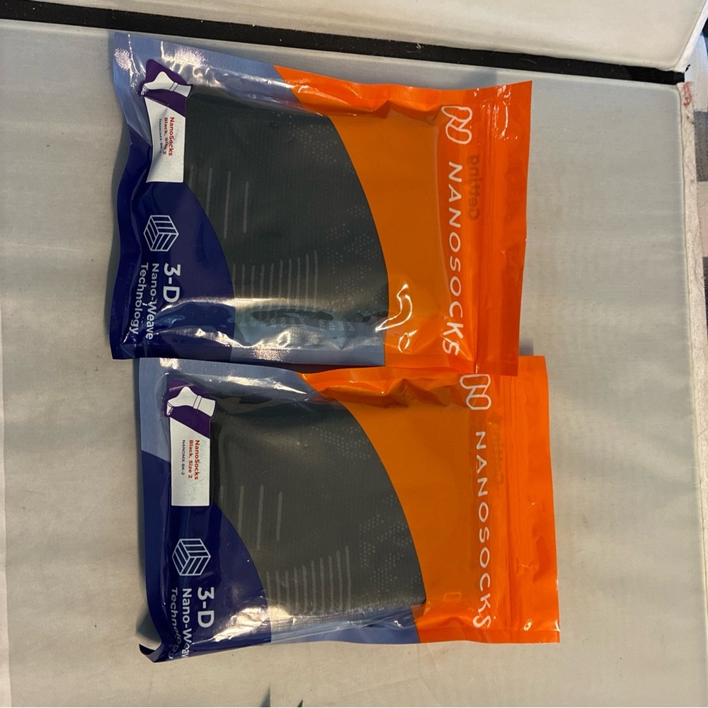 Nano 3D Nanosocks in Black and Orange Packaging - Picture 2 of 4